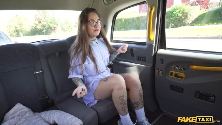 Fake Taxi Jess Mori is covered in tattoos and fucked hard by a huge cock