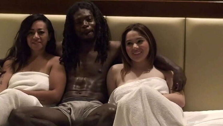 Two large-breasted amateurs take on a huge black rod