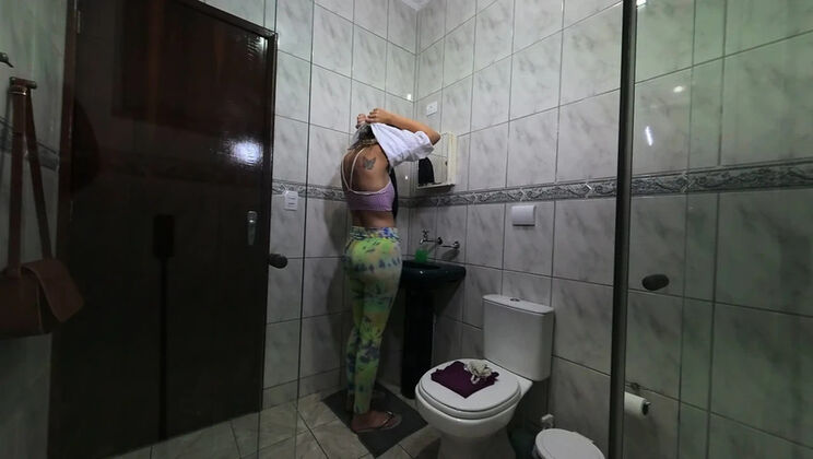 Naughty maid changes clothes in bathroom